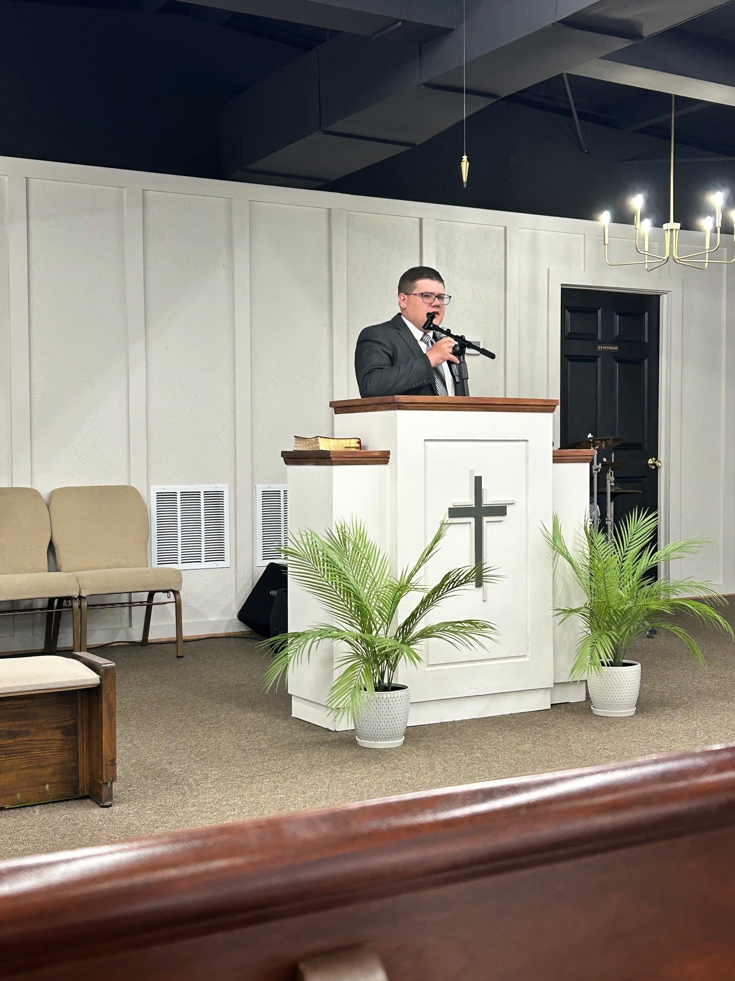 A minister preaching from the pulpit