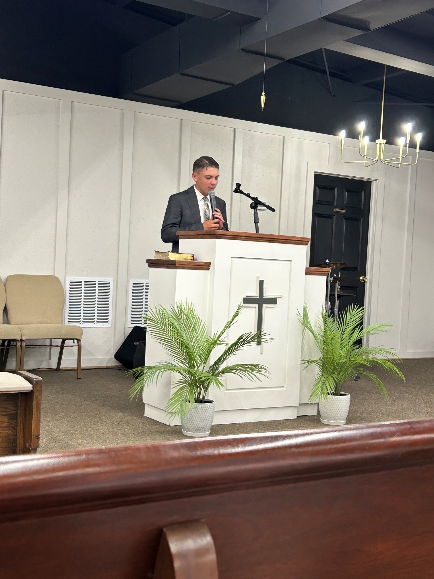A minister preaching from the pulpit